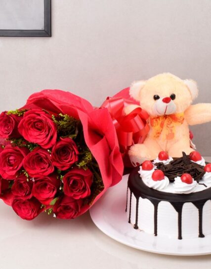 Giftnmore-10 Red Roses Bunch in Red Paper & 6 Inch Teddy & Half Kg Black Forest Cake