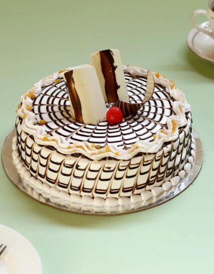 Fresh Cream Butterscotch Cake - Decorated Cake by Shilpa - CakesDecor