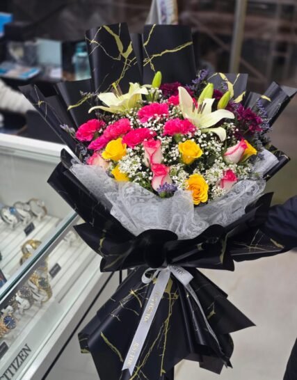 Luxury mixed flower bouquet with lilies and roses