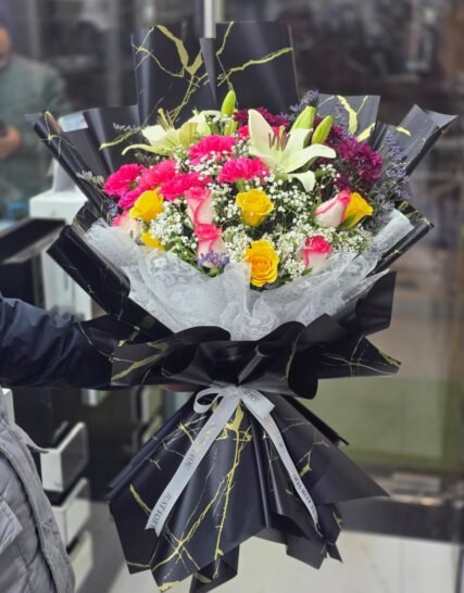 Luxury mixed flower bouquet with lilies and roses